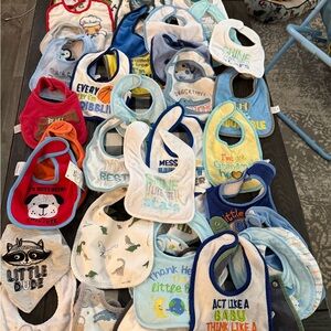 Lot of 43 bibs and 47 pairs of infant socks all very good condition.